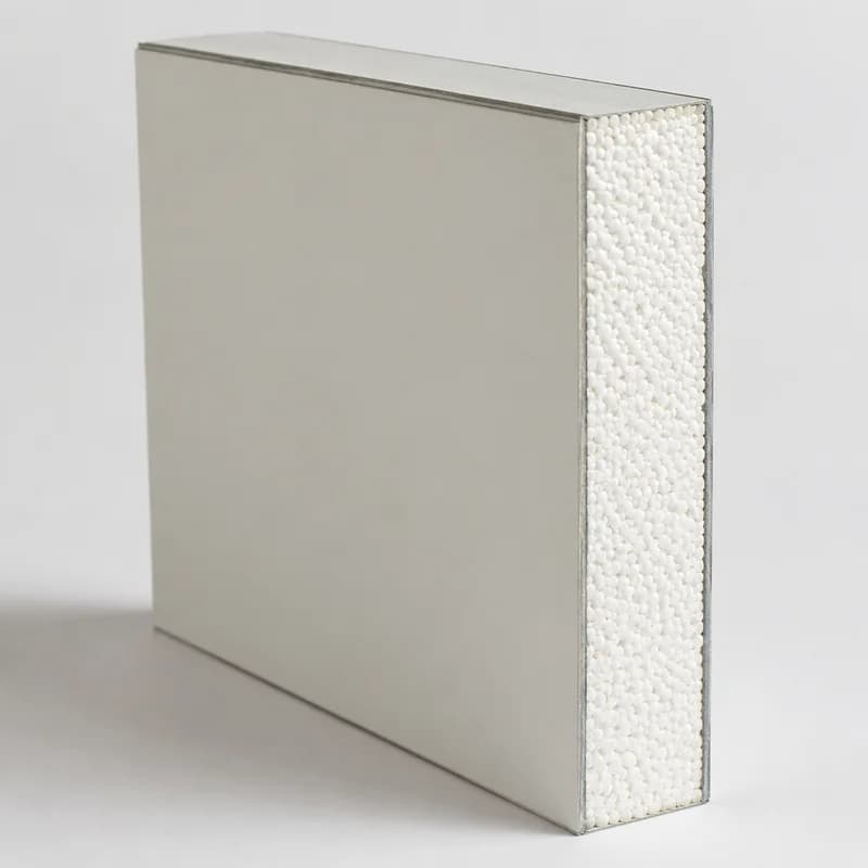 Cutaway sample of an EPS sandwich panel showing steel facings and EPS core