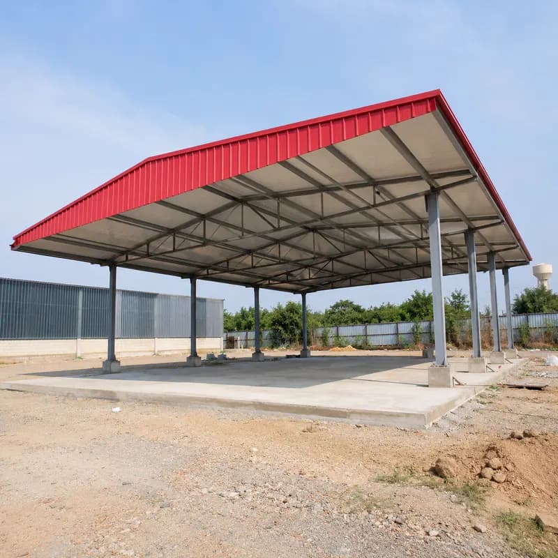 Red 60 mm PUF roof panel on a prefab shed roof