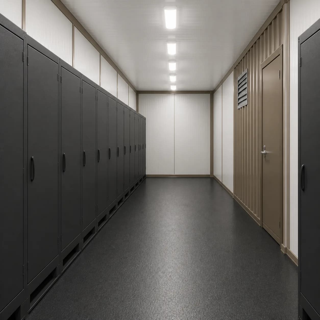 Closed equipment cabinet run beside the central service aisle inside a 30 ft BESS enclosure