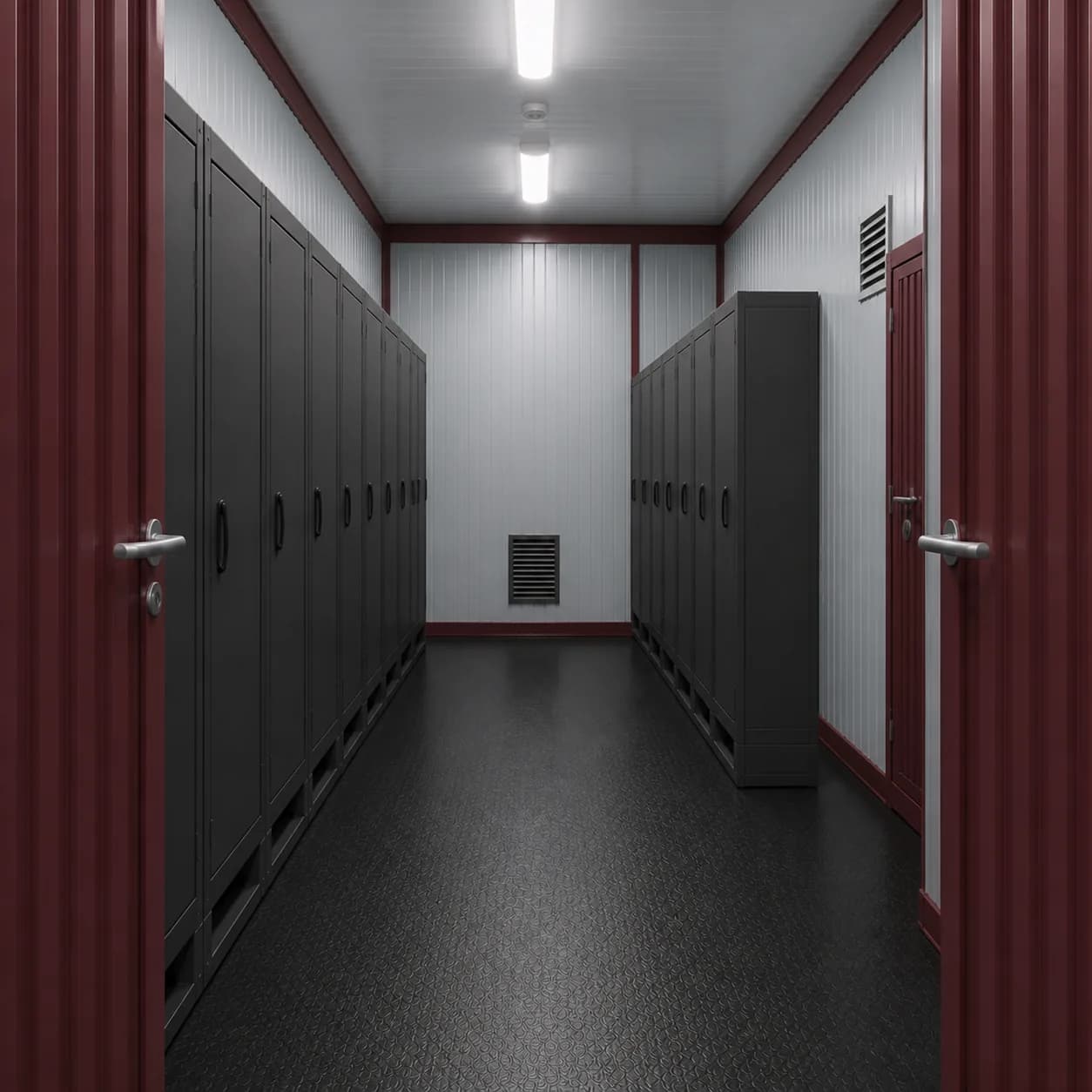 Interior aisle of a 40 ft BESS enclosure with closed equipment cabinets along both long walls