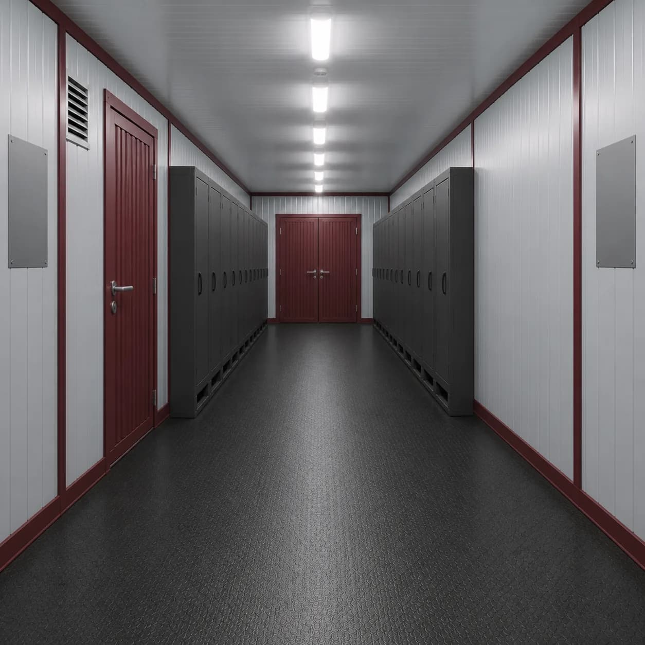 40 ft BESS enclosure interior facing the closed double end doors, cabinets each side of the aisle