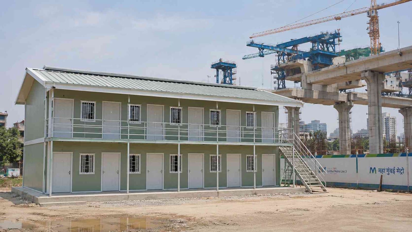 Two-storey G+1 SAMAN labor shed at a metro construction project compound in an Indian city