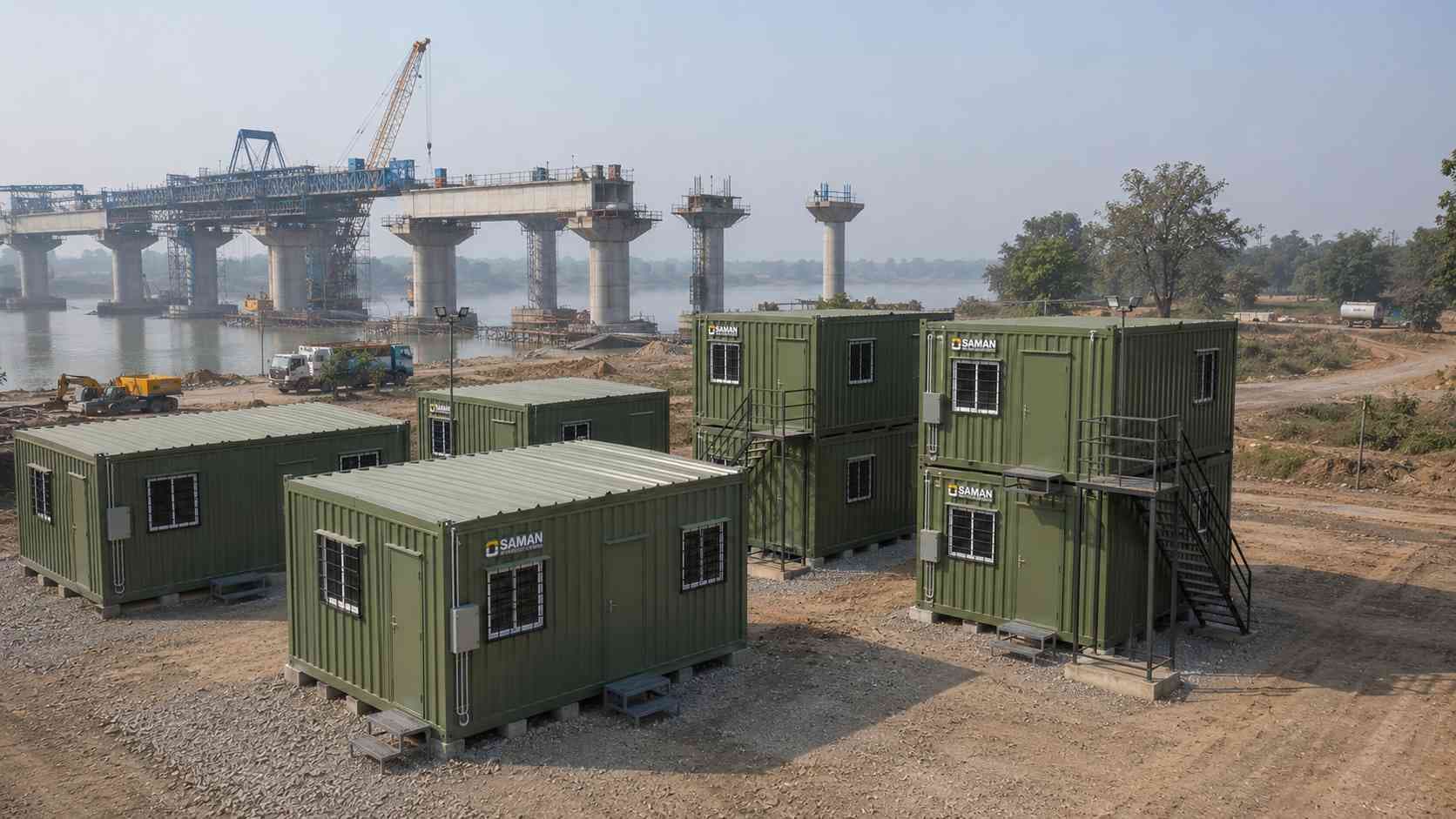 Sage Industrial SAMAN prefab labor hutments at a bridge construction site with G+1 stacking visible.