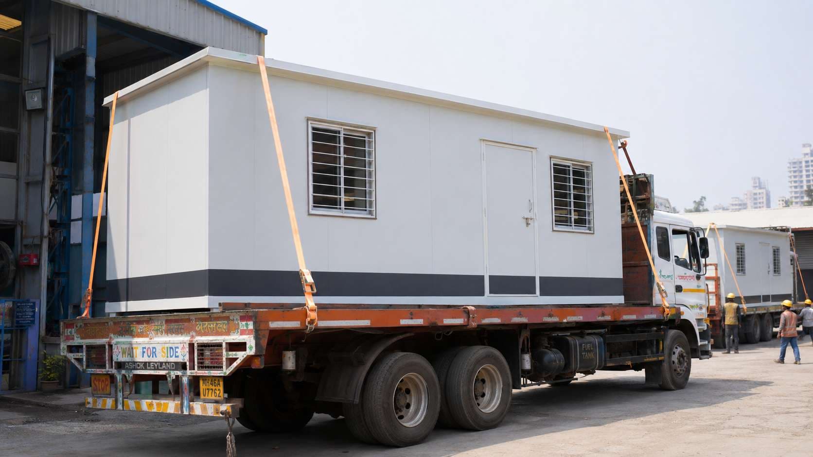 10x20 ft prefabricated portable office cabin loaded on a truck and ready for dispatch from SAMAN factory