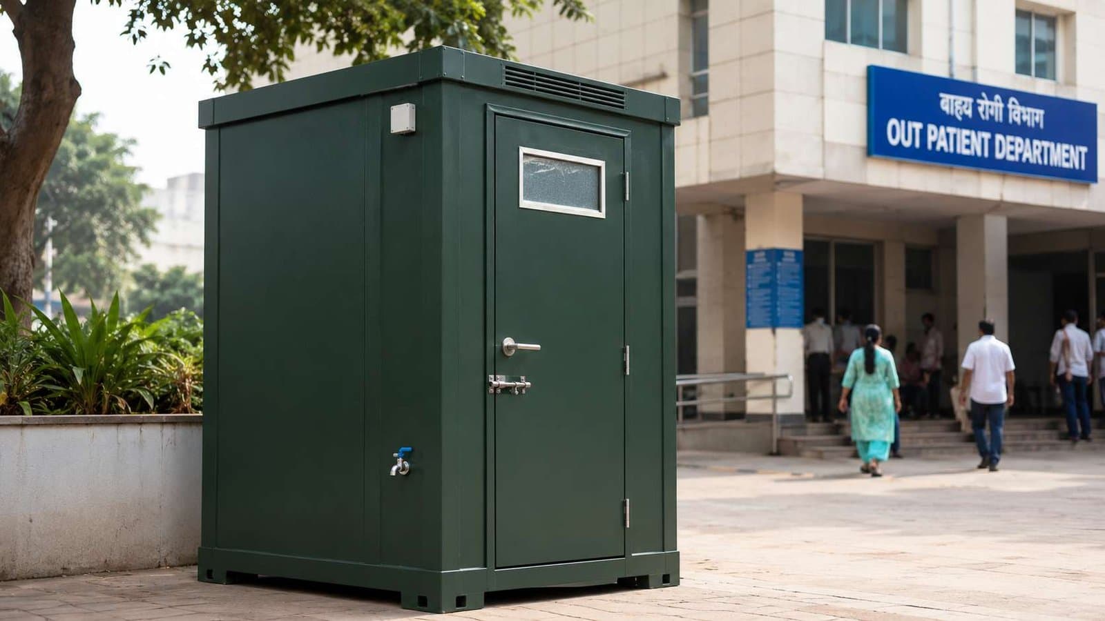 Forest green prefabricated toilet installed in the grounds of a hospital