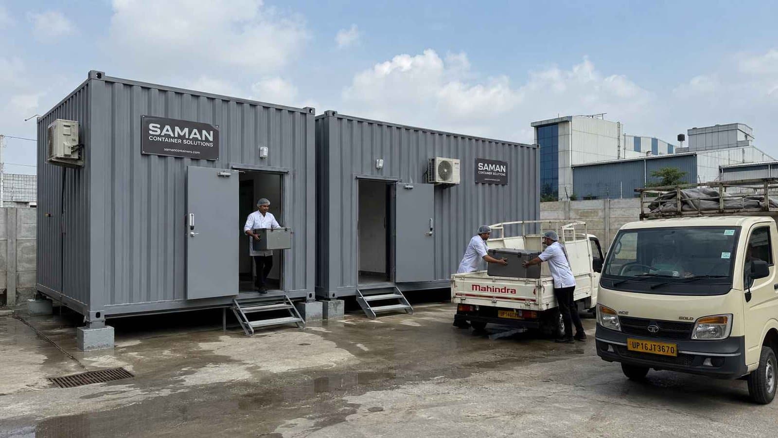 SAMAN restaurant food containers running as a central kitchen at Greater Noida with delivery vehicles loading hot food cases for multi-outlet supply