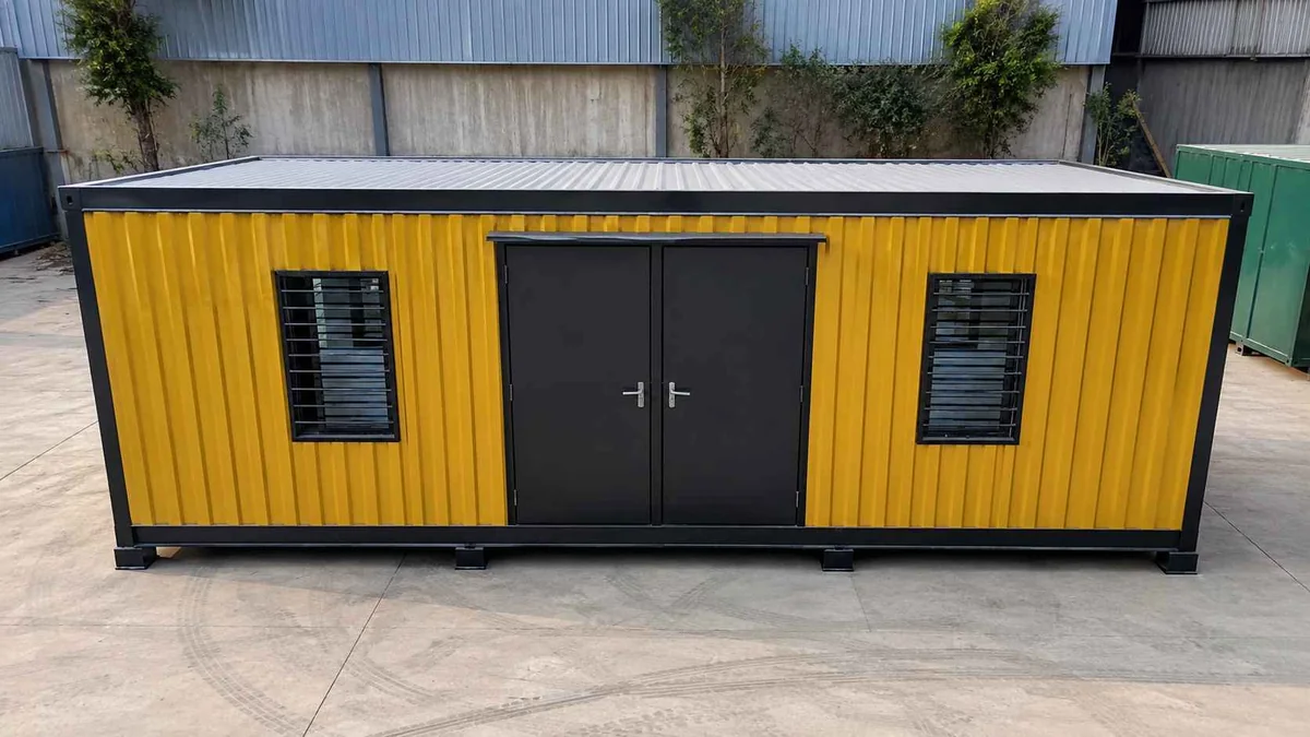 Mustard and graphite MS porta cabin with double door for a Gwalior Malanpur plot