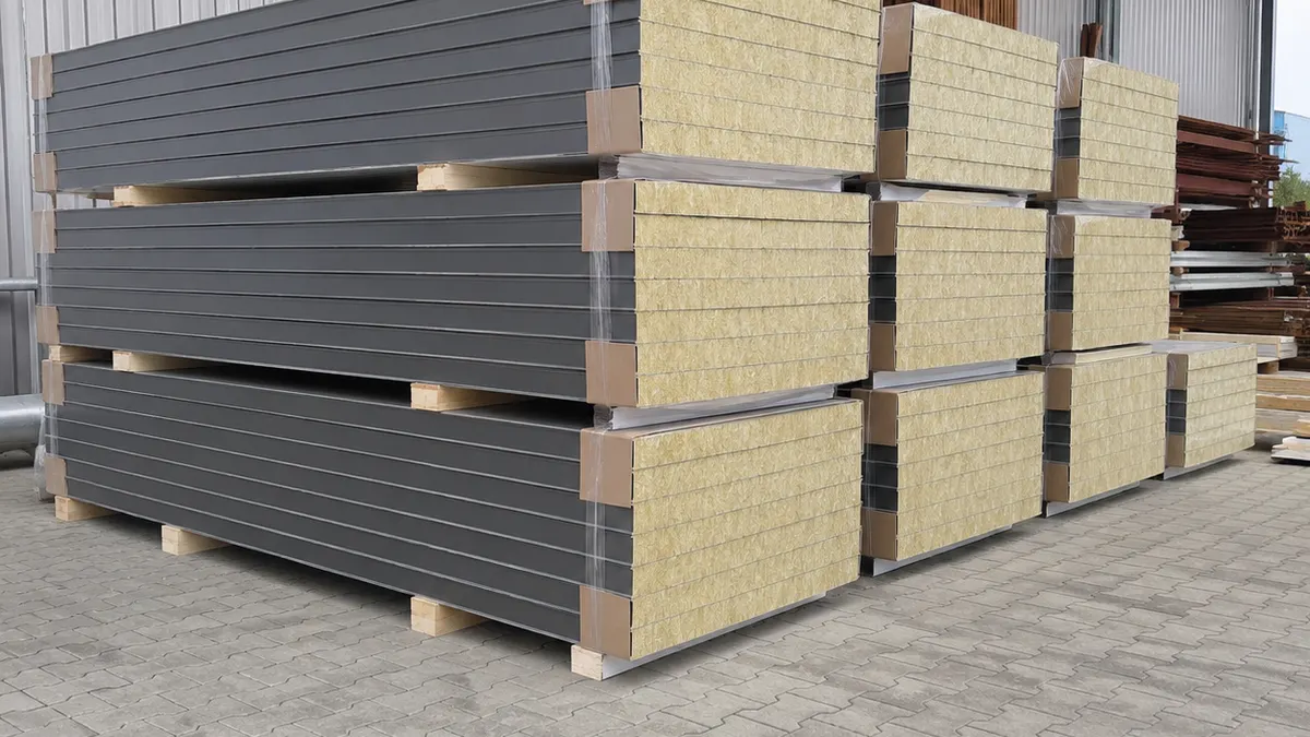 PIR panel wall and roof installation Insulated sandwich panels installed as wall and roof cladding over a steel frame