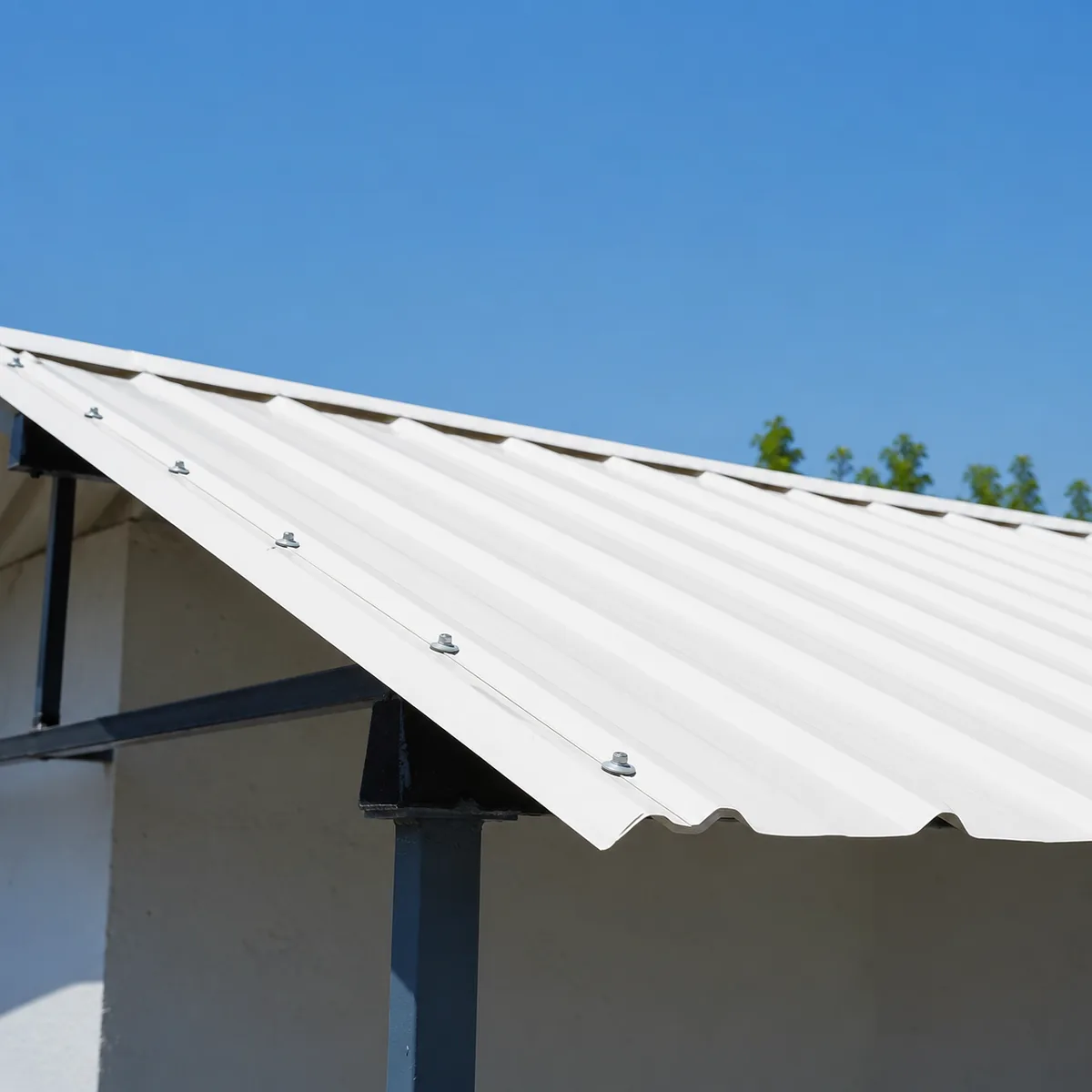 uPVC roofing sheets fixed on a steel shed roof with crest screws uPVC roofing sheets fixed on a steel shed roof with crest screws