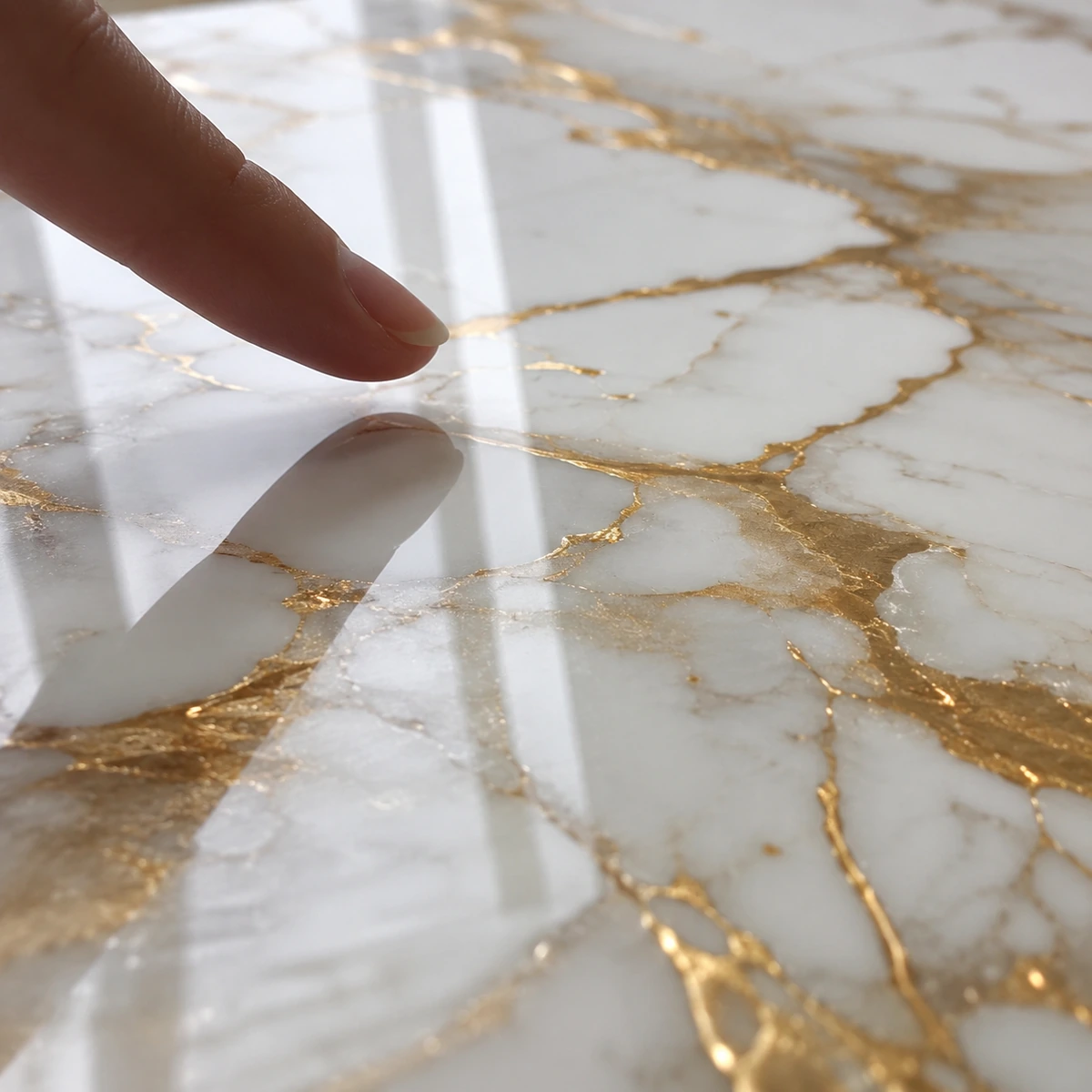 High-gloss UV marble sheet surface with white and gold veining High-gloss UV marble sheet surface with white and gold veining